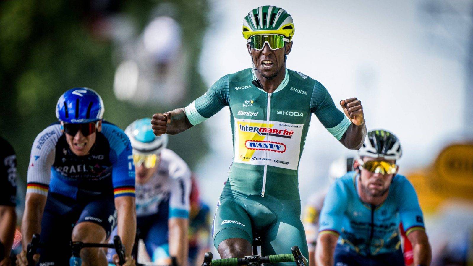 Eritrean Biniam Girmay Hailu of Intermarche-Wanty celebrates as he crosses the finish line to win stage 12 of the 2024 Tour de France cycling race, from Aurillac to Villeneuve-sur-Lot, France (203,6km) on Thursday 11 July 2024. The 111th edition of the Tour de France starts on Saturday 29 June and will finish in Nice, France on 21 July. BELGA PHOTO JASPER JACOBS